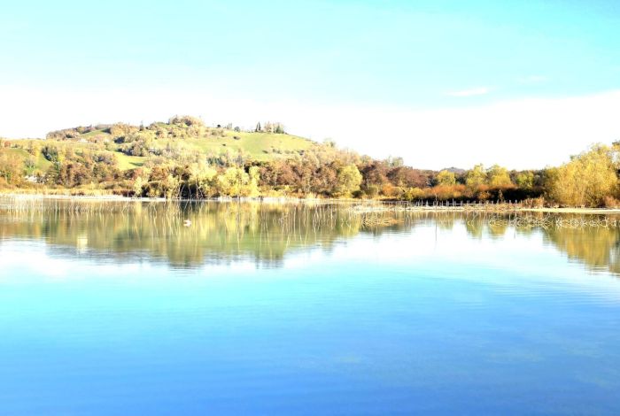 Lac de Paladru in autumn from the campsite, peaceful setting for senior holidays
