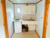 Chambre du chalet PMR avec lit réglable, camping Détente et Clapotis, Lac de Paladru Isère
